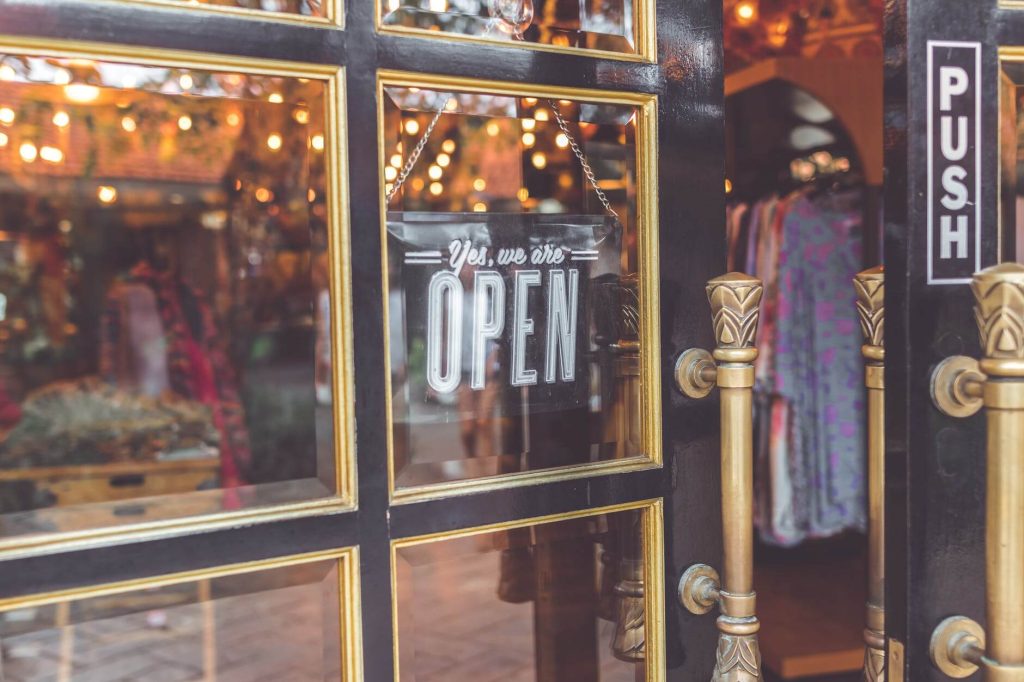 open sign in a shop window