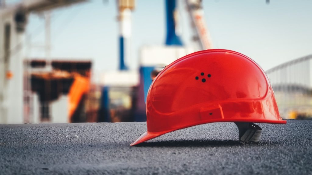 a construction hard hat to represent how to find new suppliers